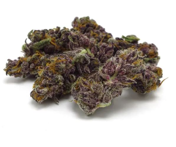 a pile of purple weed sitting on top of a white table