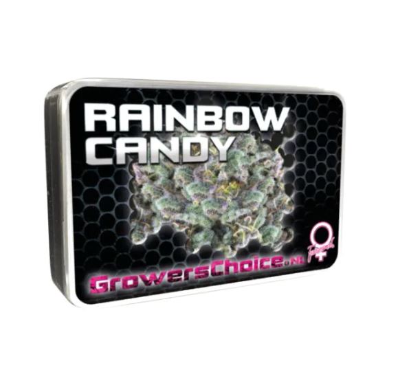 a tin of candy sitting on top of a white table
