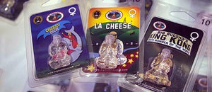 three different types of cheese in plastic packaging
